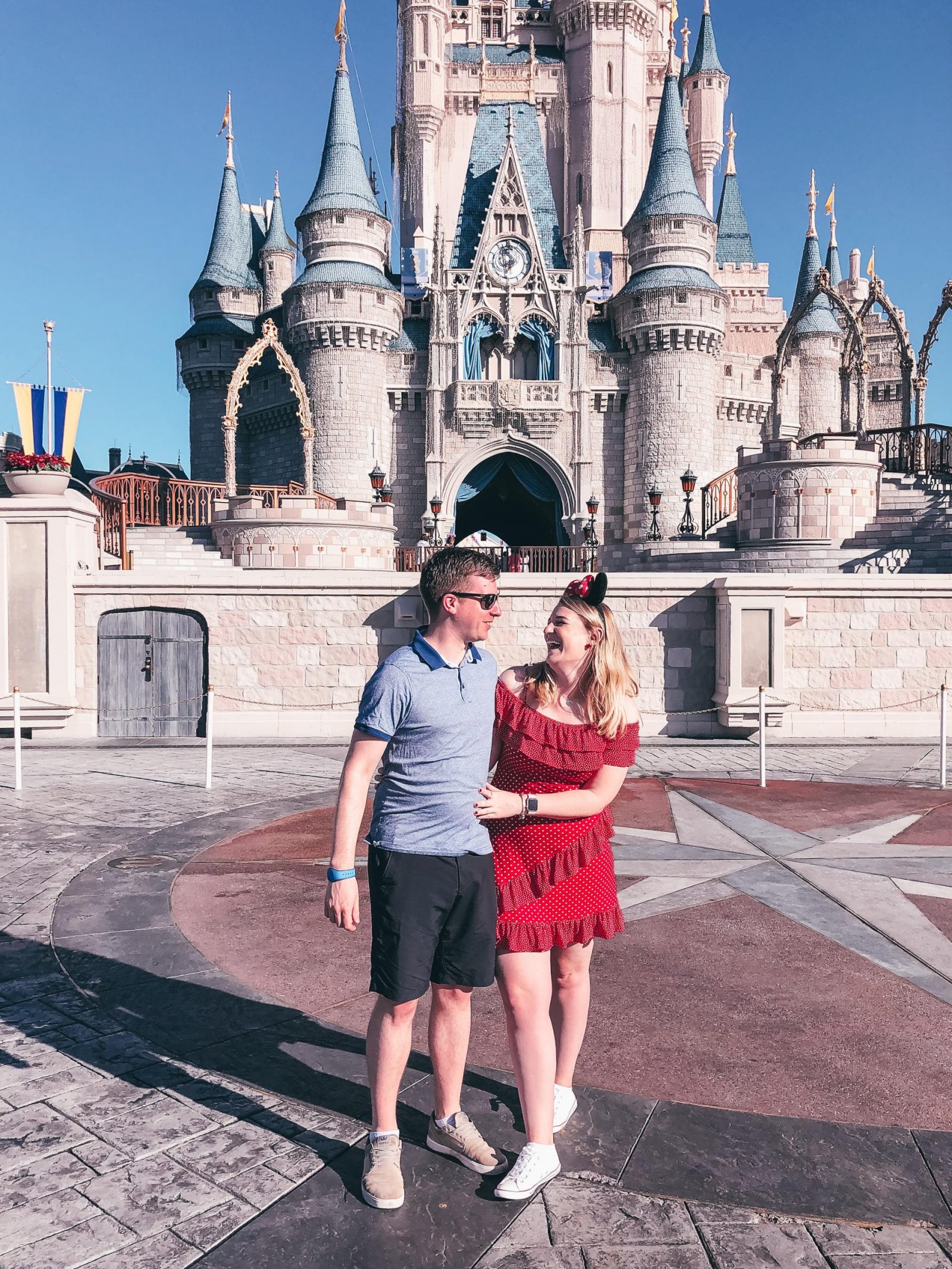 Charlotte and Adam in front of Cinderella Castle, Magic Kingdom 